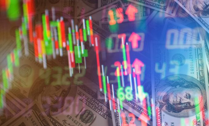 Double exposure of stock market in tablet with money and chart.