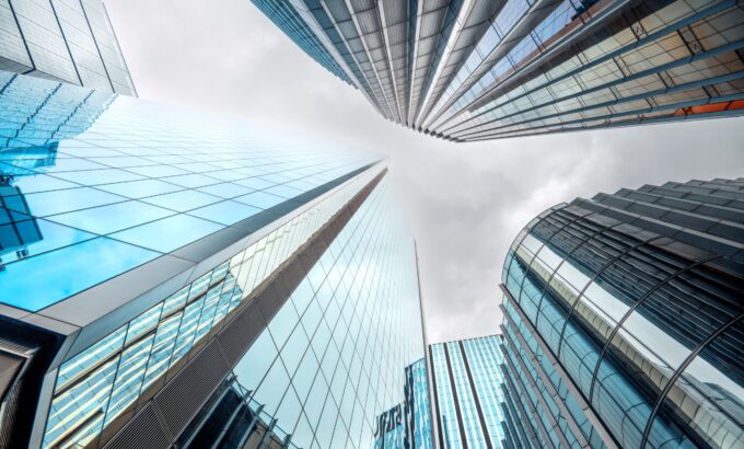 Bottom-up view of London City financial district with multiple skyscrapers, United Kingdom